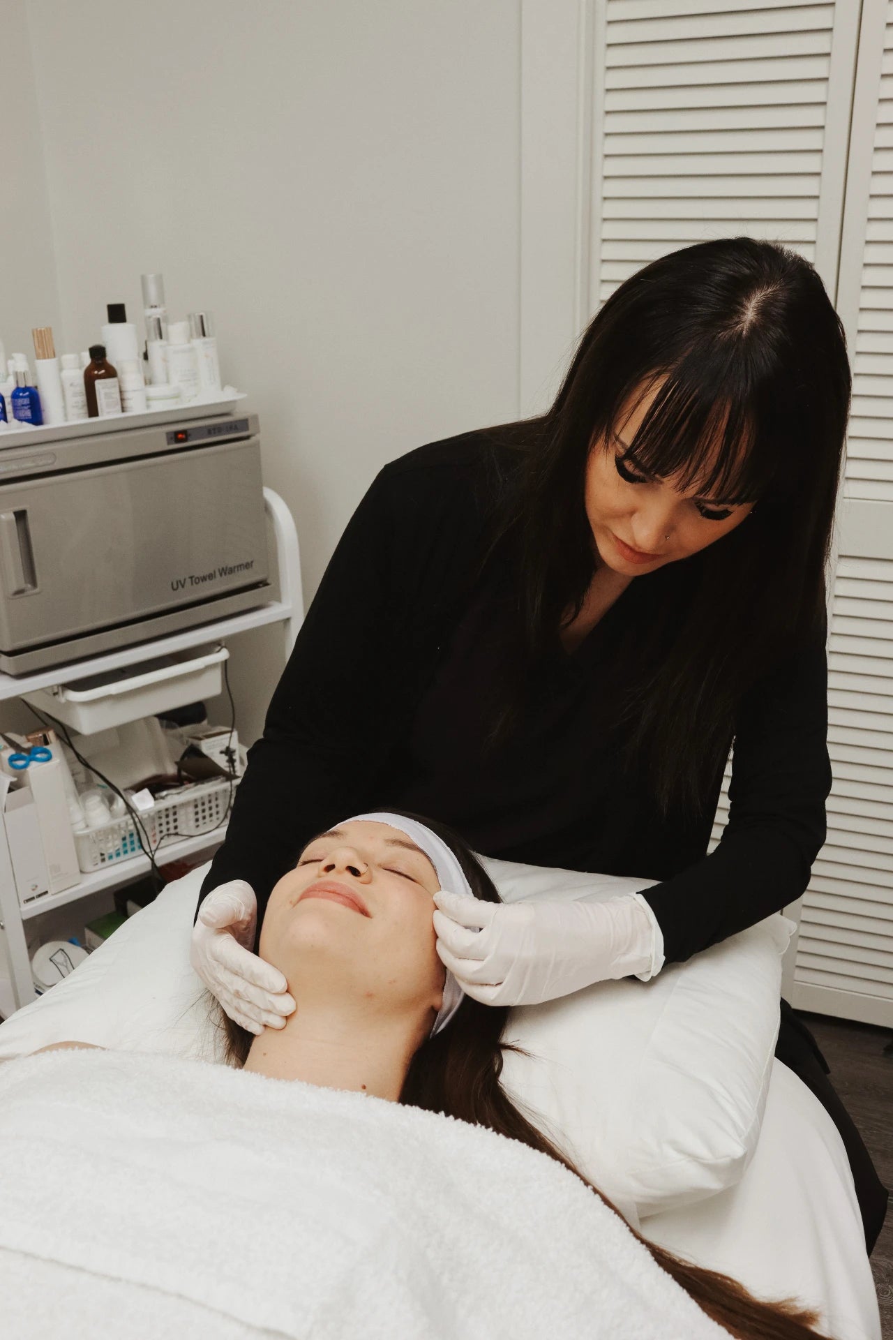 Woman receiving skin tightening treatment