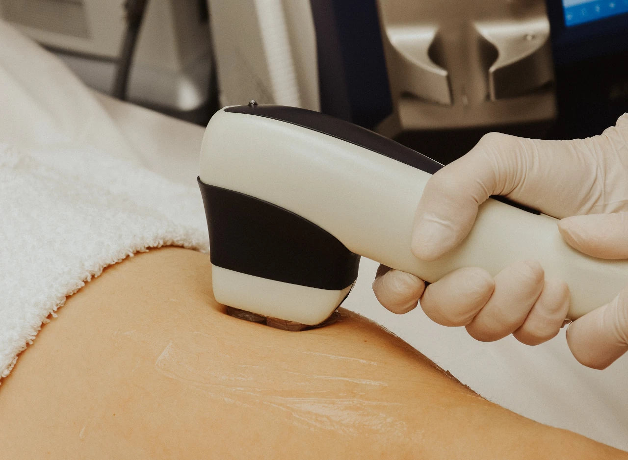 Woman receiving laser hair removal treatment