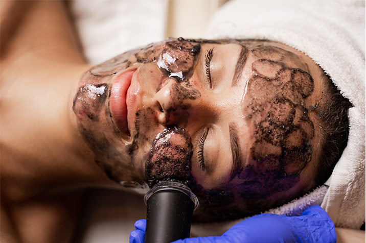 Woman receiving OxyGeneo Facial Treatment